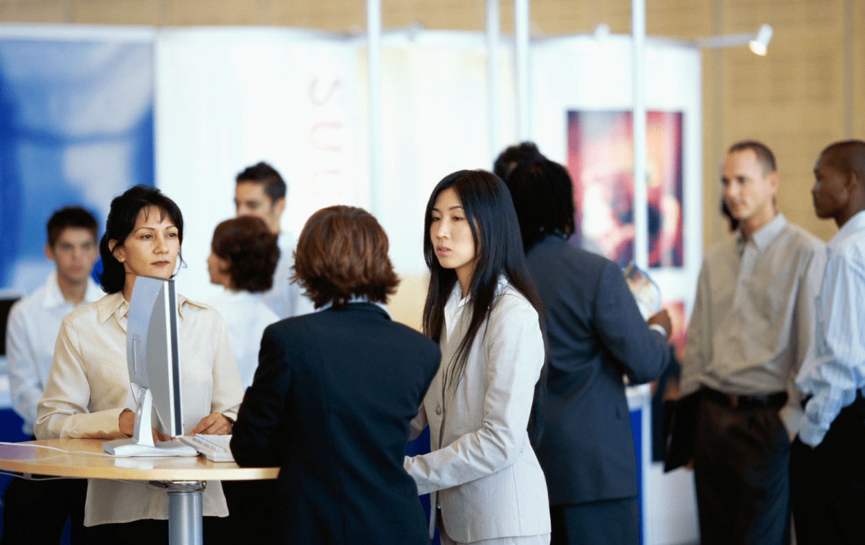 Business people interacting at a conference